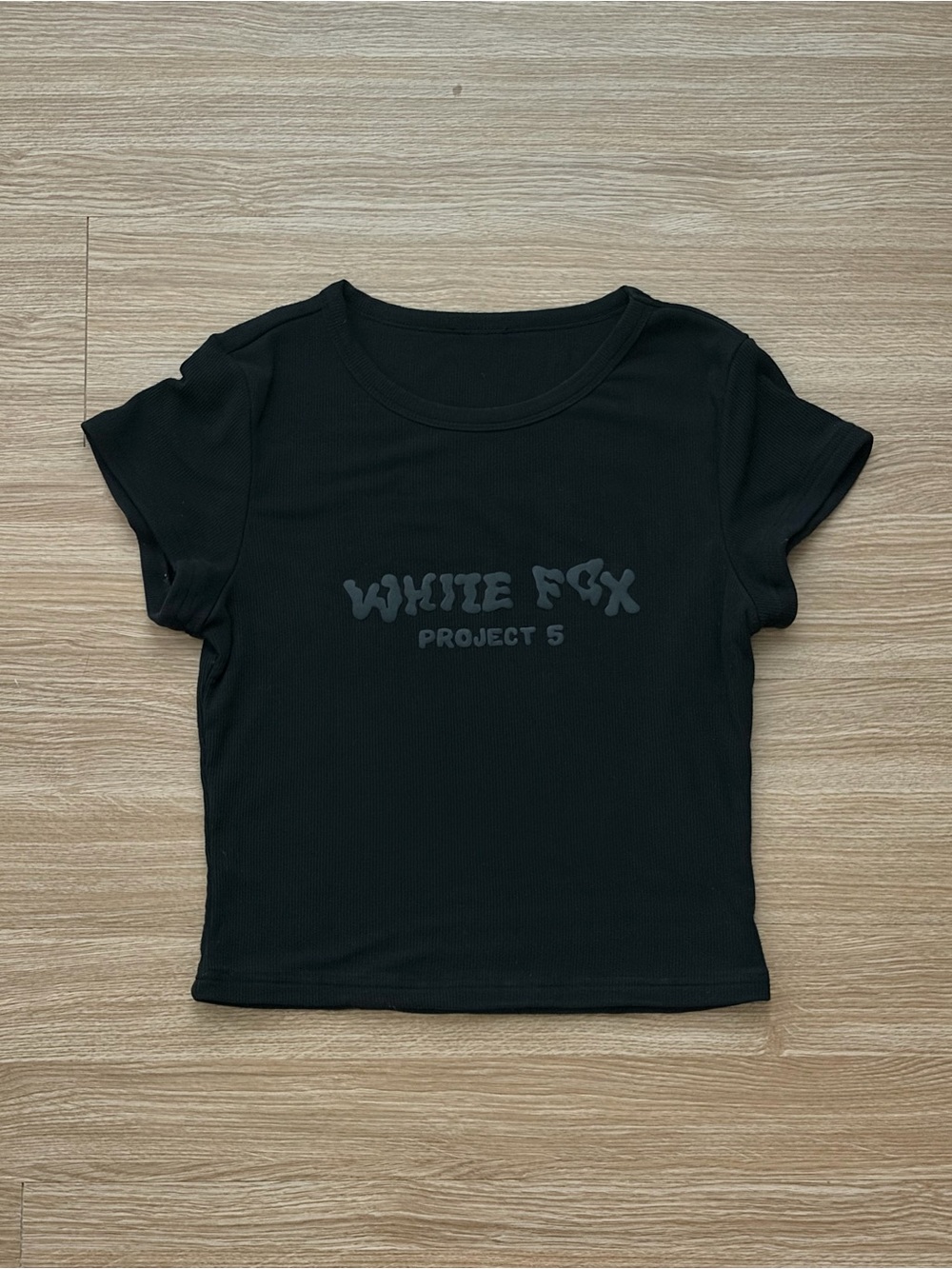 White Fox Boutique Black Ribbed Baby Tee with 'WHITE FOX PROJECT 5' Graphic